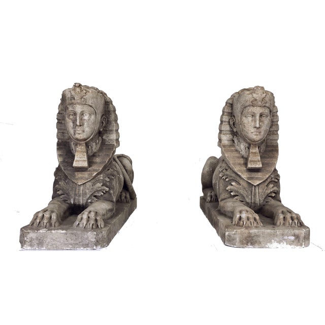 Large Identical pair of weathered white marble sphinxes with idealized female faces. Now on modern, custom wood pedestals,...