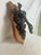 This fascinating antique brass door knocker depicts three gargoyles, which are sure to scare off any intruders! This piece...