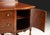 Antique walnut sideboard featuring beautifully figured walnut burl panels, decorative carvings, and elegant turned legs...