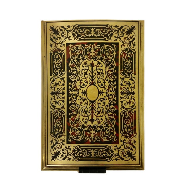 An 1890s English blotter. Bronze, tortoiseshell inside with a leather bottom. In very good condition especially the...