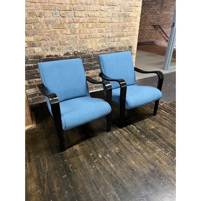 This lovely pair of 1940's Thonet bentwood lounge chairs was recently reupholstered in an amazing performance fabric from...