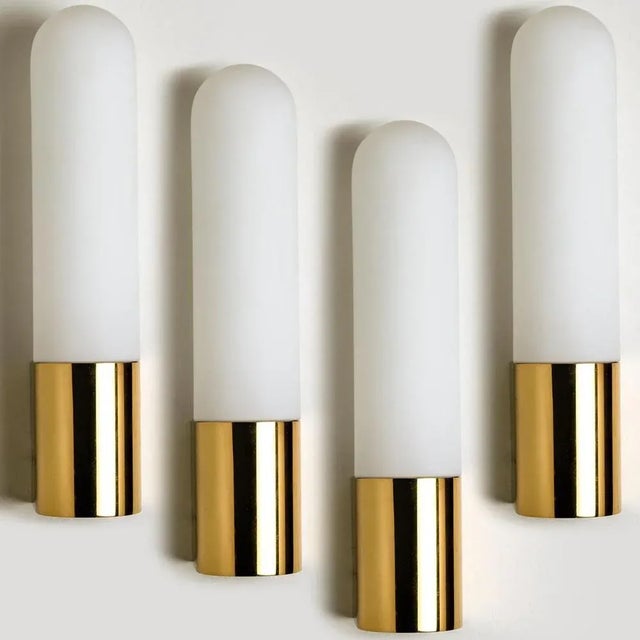 Heavy quality glass lamps with brass base. Beautiful white, opaque glass. Manufactured by the company Glasshütte Limburg,...