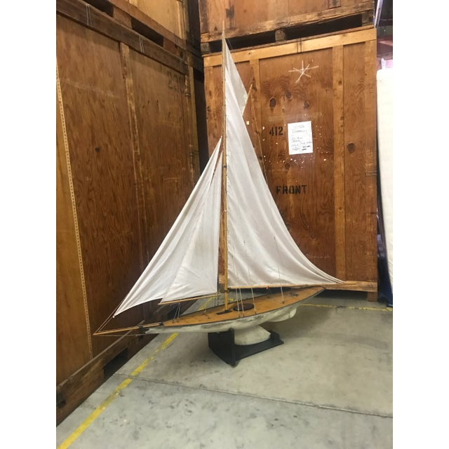 Wonderful large sailboat model with wooden deck and fabric sails. Beautifully made.