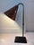 Art Deco revival hand crafted table lamp. Conical, hammered copper shade with hand wrought steel base and ball pull chain...