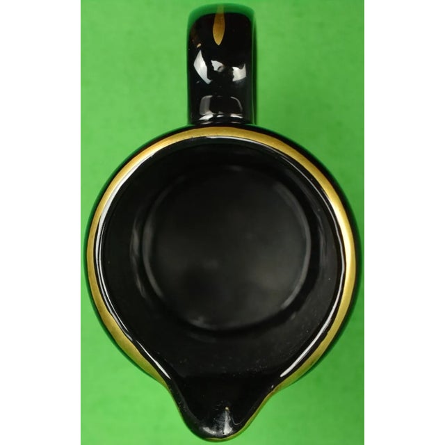 Sz: 6 1/2"H x 5 1/4"W (including handle)