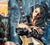 "Safe Place" is an oil on canvas painting with gold leaf and acrylic paste, cm 80x120. Music is the woman's safe place,...