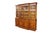 This large, late 20th-century custom-made English Georgian / Regency style walnut breakfront features a classic four-door...