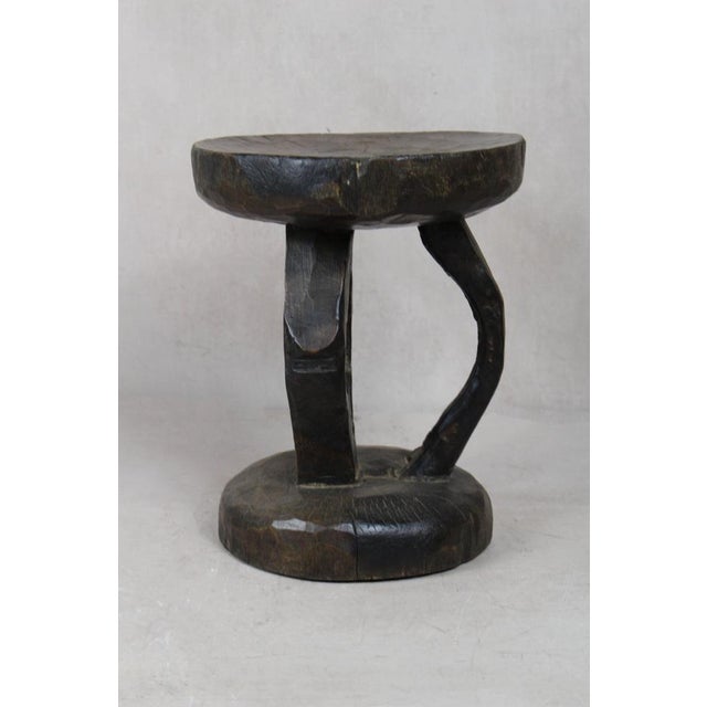 Hand-carved from a single piece of wood, the Tonga stool is a genuine artifact. These stools were status symbols for...
