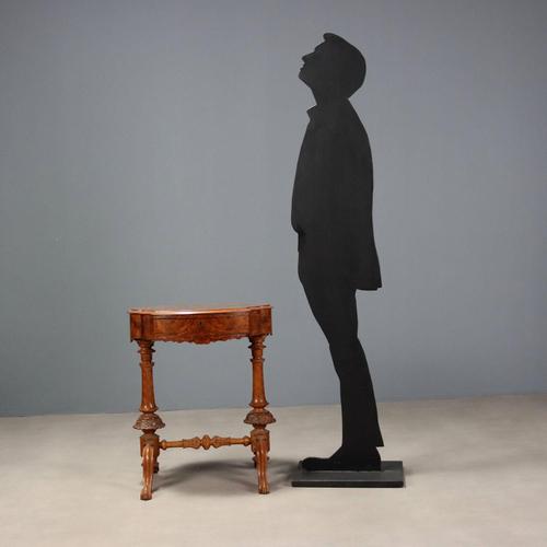 Walnut and walnut burl coffee table. Top inlaid with scrolls and floral arrangements in maple and stained maple, drawer in...