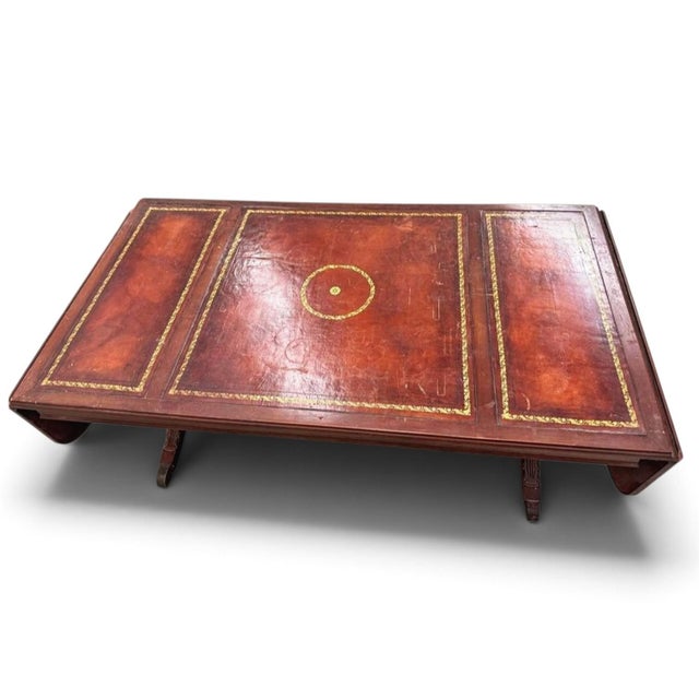 Antique Brandt drop-leaf coffee table an elegant centerpiece with a story to tell. This rare Coffee Table brings timeless...