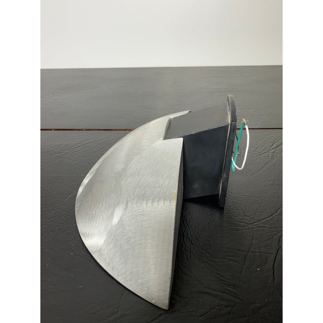 Bring a dose of authentic industrial modernism into your space with this Ron Rezek brushed‑metal wall sconce, salvaged...