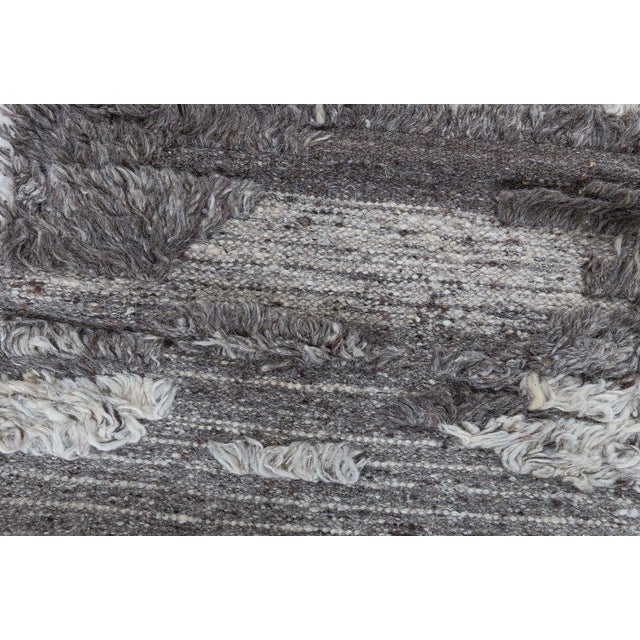 Abstract Modern Tulu Nadu ‘Beige Strata’ Wool Rug by Doris Leslie Blau. Size: 4'4" × 6'8" (132 × 203 cm) An expressive...