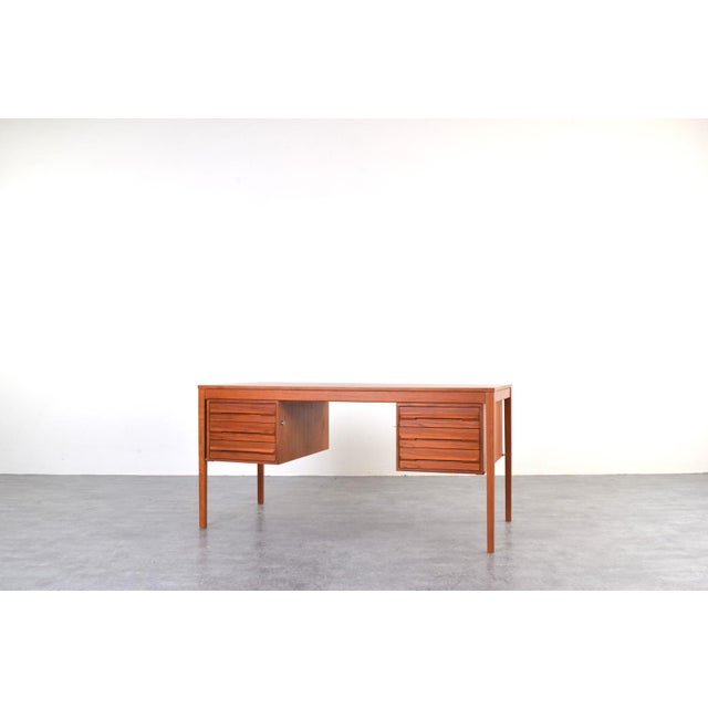 This teak desk was designed in the 1960s by leading Norwegian designer Torbjørn Afdal and manufactured in Norway by...