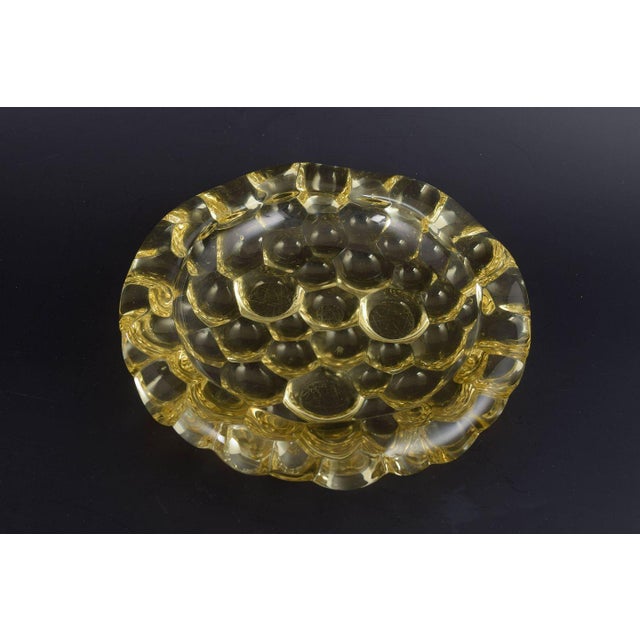 Pierre d’Avesn Art Deco Bowl, c. 1930s. Rare yellow pressed-glass bowl with characteristic Art Deco ornamentation and...
