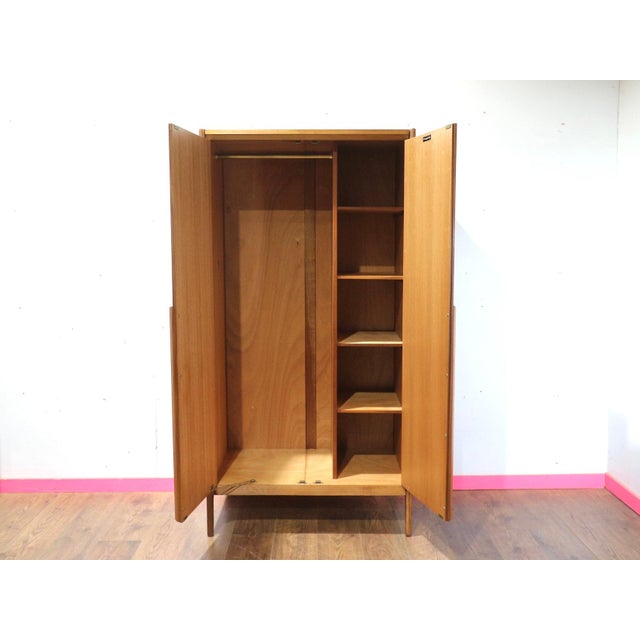 Discover a stunning mid century gentleman's armoire by renowned British furniture maker Younger, exclusively at Mid...