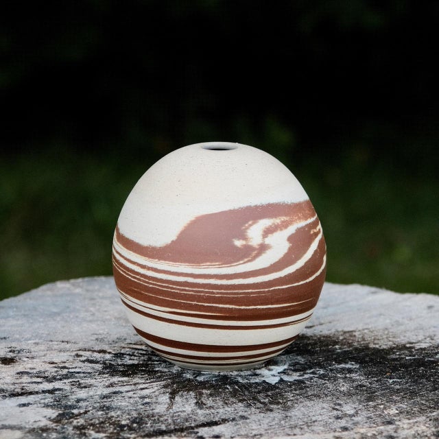 Marbled stoneware moon jar/orb vase, created by Hiraeth Ceramics in the Adirondacks, NY. It's wheel-thrown from marbled...