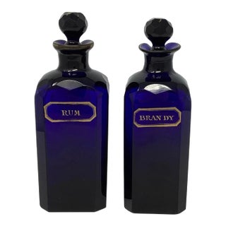 Pair of Mid 19th Century Bristol Blue Decanters With Gilt Decorations For Sale