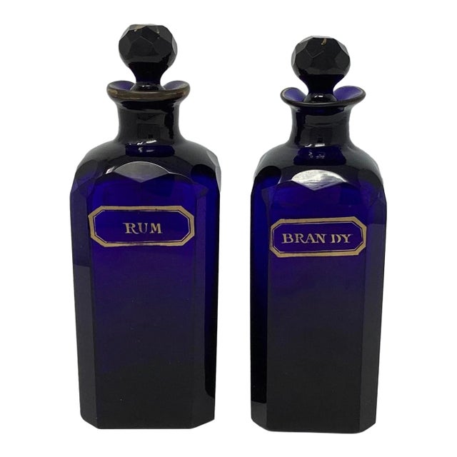 Pair of Mid 19th Century Bristol Blue Decanters With Gilt Decorations For Sale