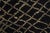 Darkness and light, woven into one extraordinary floor piece. This large-format hand-knotted Moroccan rug commands...