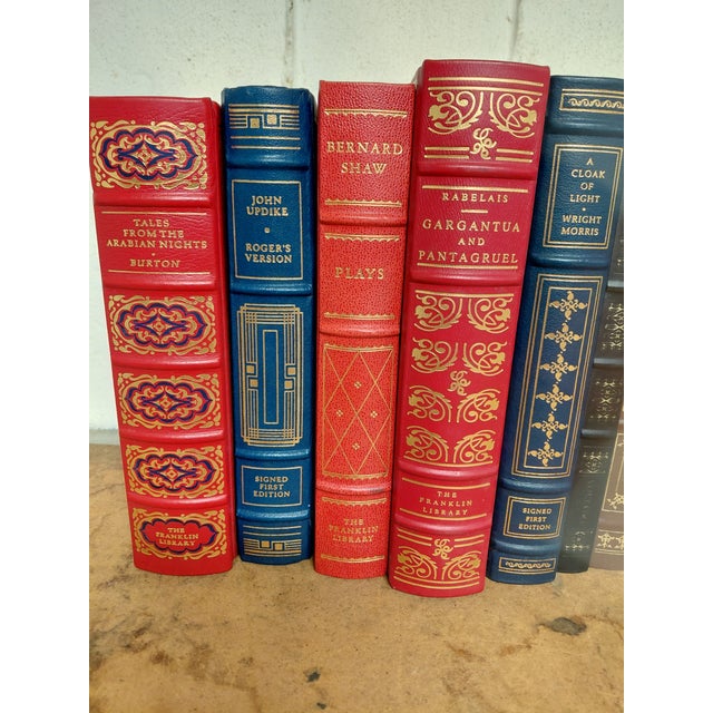 Set of 11 Books. 10 Franklin Library Books, I believe 5 are leather and 5 are leatherette? 1 being signed John Updike in...