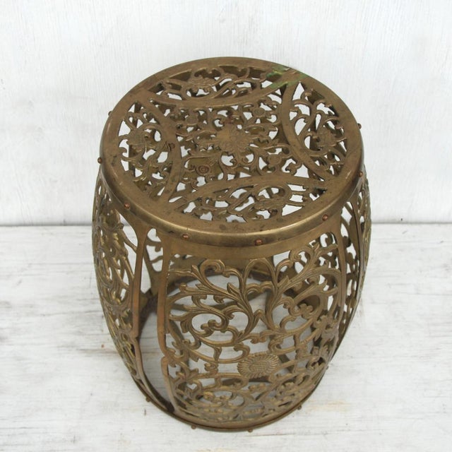 Heavy, polished brass stool. Chinoisere style, with floral fretwork throughout.