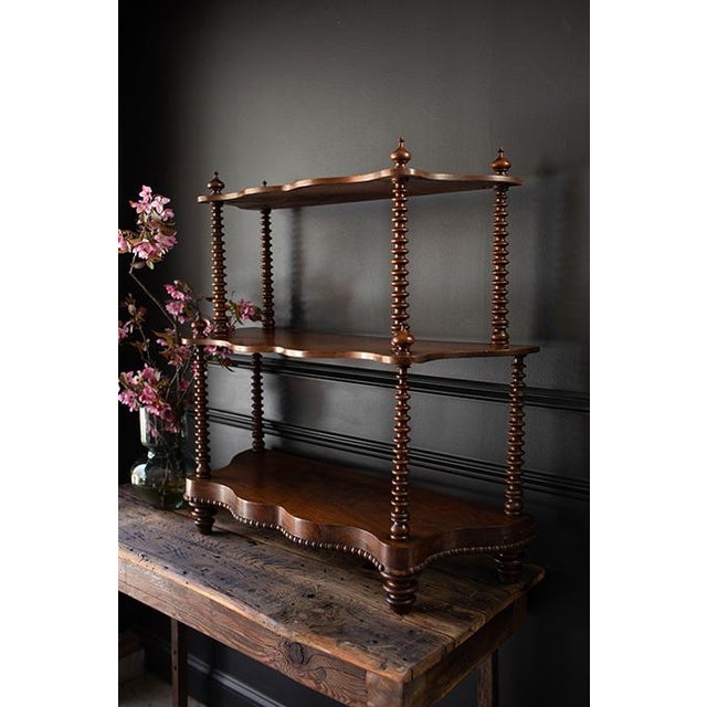 Beautiful mahogany antique shelf in the Victorian/Edwardian style, featuring classic bobbin-turned spindles and delicate...