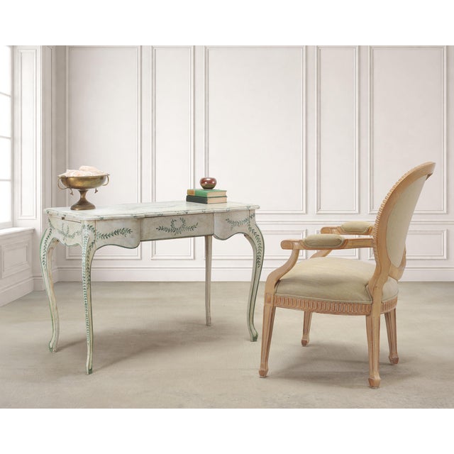 A charming Venetian-style painted writing table or desk made in the country Italian, or French Louis XV provincial taste....
