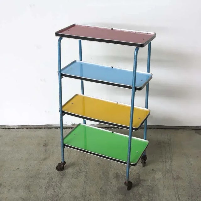 - Industrial shelves on wheels - With four different colored storage compartments - Storage banners and foils have been...