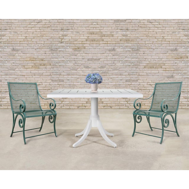A luxurious "Maury" square dining table (Model 960A-A-45-SQ) by McKinnon and Harris, hand-crafted from high-performance...