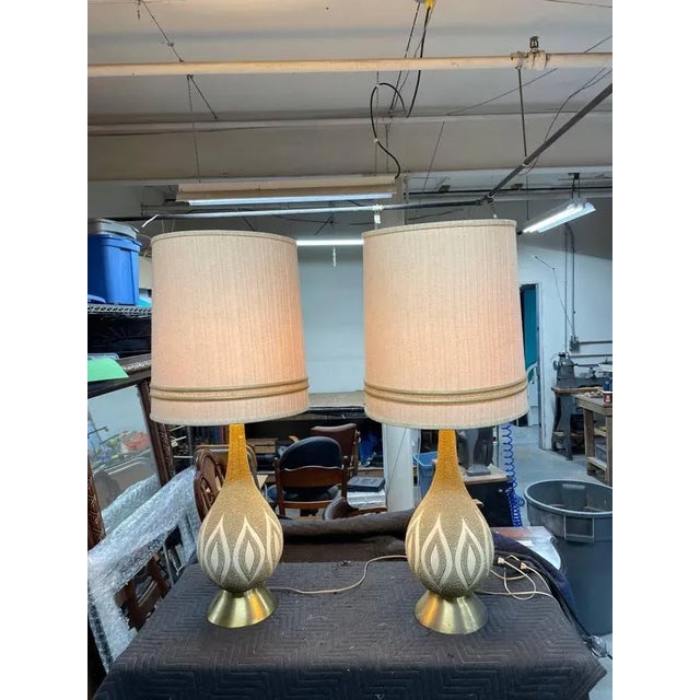 Rare and hard to find mid century mordern chalkware lamps. Both are identical and in great condition for the age. From the...