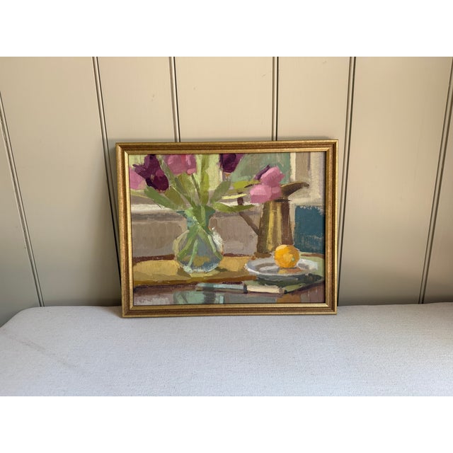 This is a lovely still life painting of tulips and a lemon set in front of a window. I enjoy the light in the painting and...