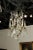 Brass French 19th Century Six-Light Bronze and Crystal Chandelier with Scrolling Arms For Sale - Image 8 of 12