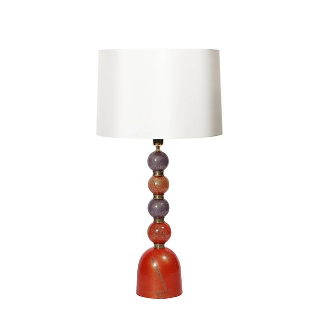 Exuding timeless elegance and vibrant charm, these mid-century table lamps are exceptional examples of Murano glass...