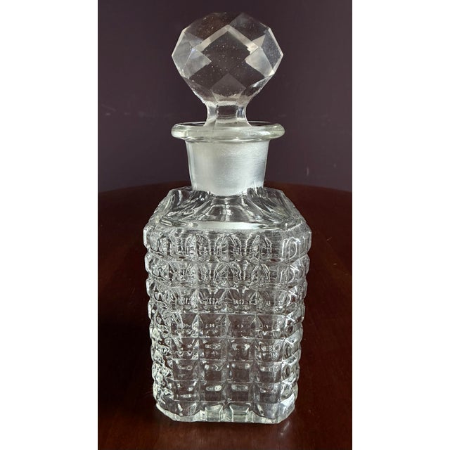 Beautiful vintage antique pressed glass perfume bottle with original cut glass stopper.