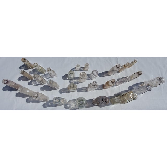 Beautiful mixed lot of authentic antique medicine, apothecary, and druggist bottles from the late 1800s to early 1900s....