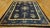 Textile Exceptional Navy Blue Color With Lovely Chinoiserie and Floral Design Antique Chinese Perking Rug For Sale - Image 7 of 10