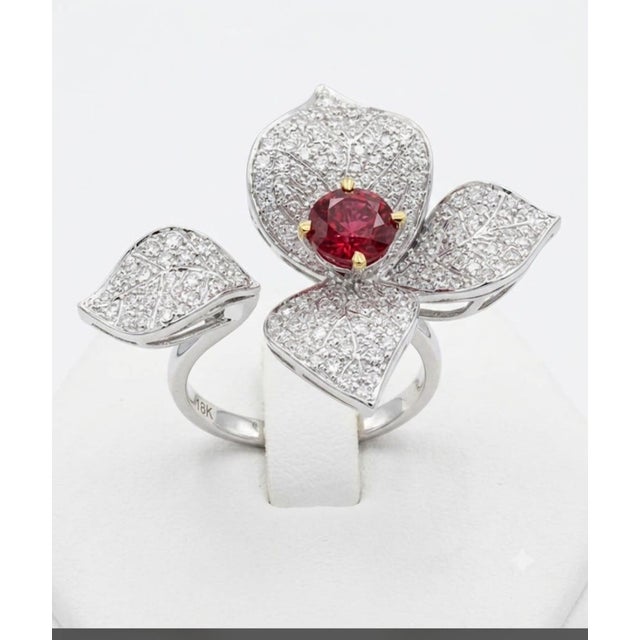 Gemstone details Ruby: 1.45cts Diamond: 1.4cts G. wt: 10.08 grams N. wt: 9.51 grams 18K gold We encourage you to examine...