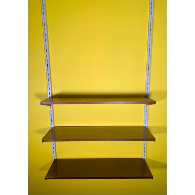 Step back in time and add a touch of retro charm to your living space with this exquisite original 1960s wall unit...