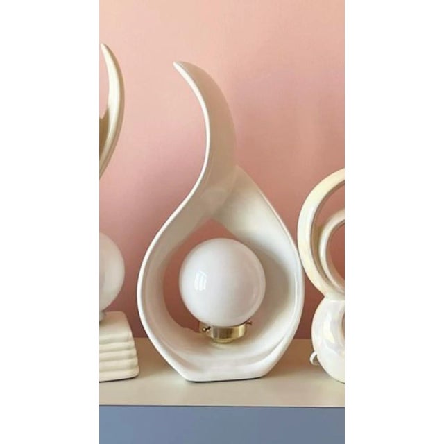 Beautiful ceramic flame lamps from the 1980s. I am selling as a pair.