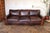 A beautifully worn-in three-seat leather sofa by Restoration Hardware, offering a perfect blend of comfort, scale, and...