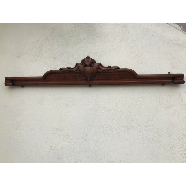 Historic walnut pediment. Beautifully carved from the 19th century Decorative walnut strip, ideal for decorating the wall,...