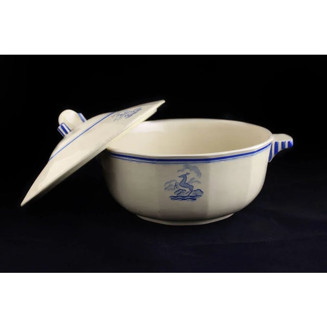 Rare Bosch Freres soup tureen. Ivory color decorated in blue with deer. Under the base, the Bosch Freres brand name in...