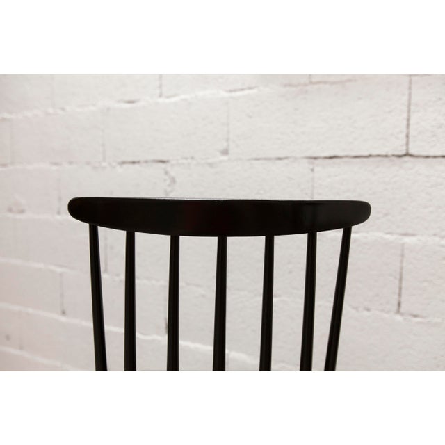 Pair of Scandinavian Fanett chairs by Ilmari Tapiovaara, made of black teak, dating from the 1960s. These chairs were...