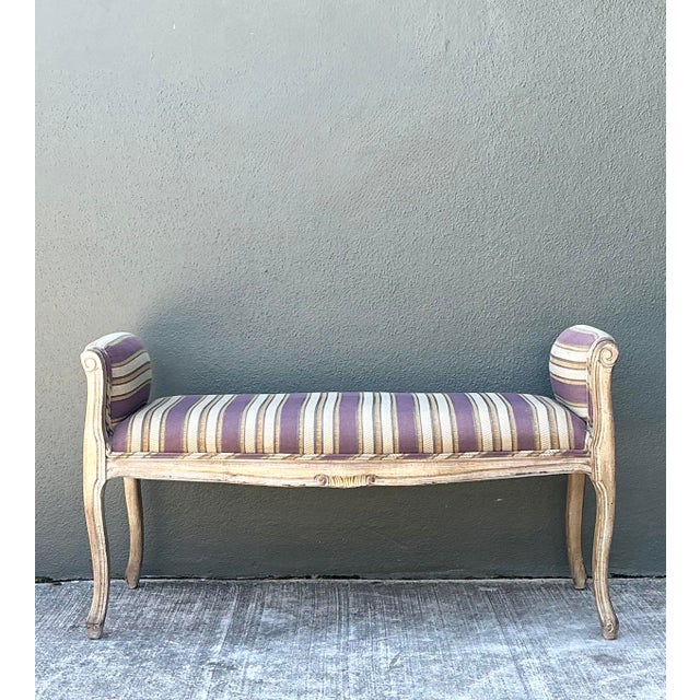 Embodying the romantic elegance of the French Provincial era, this Louis XV-style bench is a stunning addition to any...
