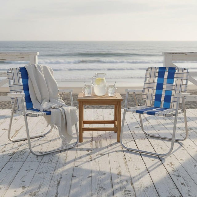 Classic mid-century American lawn chairs, likely produced in the 1950s–1970s when aluminum-frame webbed seating became a...