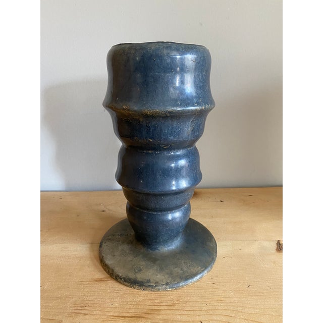 Wonderful and very heavy painted metal vase. It's pierced so it could be used for dried / faux flowers or branches. We...