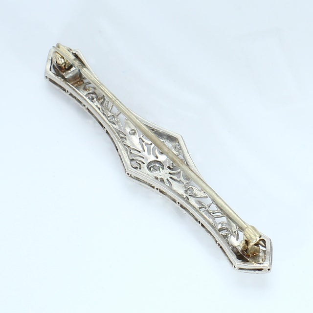 Mid 20th Century Elongated Platinum Brooch With 3 Diamonds and Filigree Design For Sale - Image 4 of 4