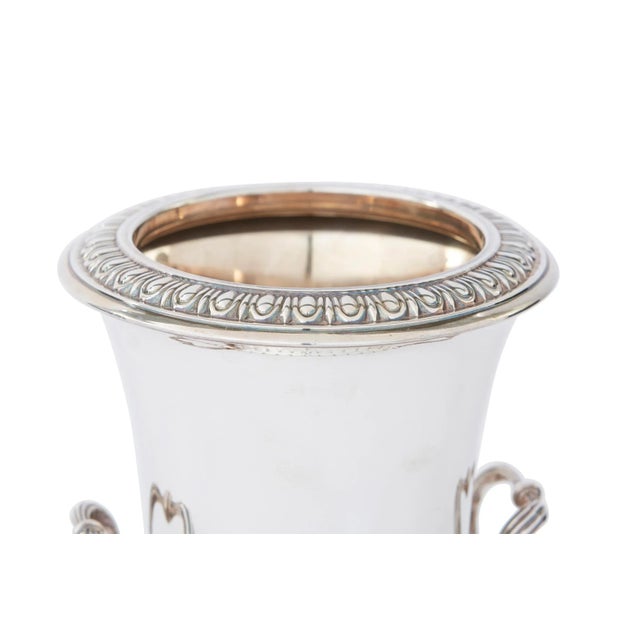 Large sterling silver with gold wash interior / exterior design details and side handles wine cooler or ice bucket. The...