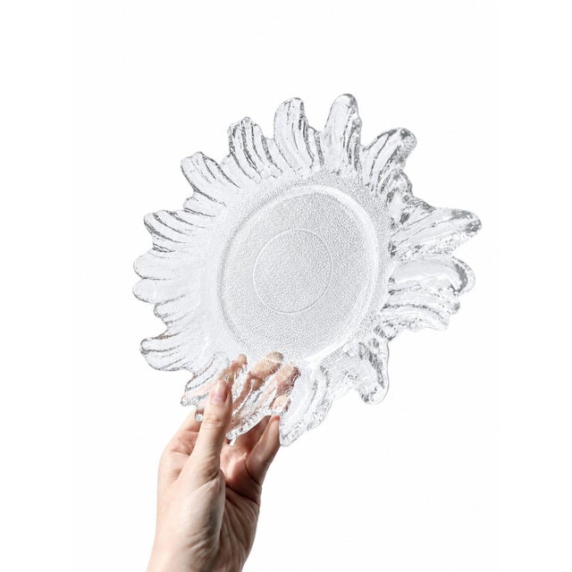 An expressive example of Swedish design from the legendary Lindshammar Glasbruk glass factory, founded in 1905 and...