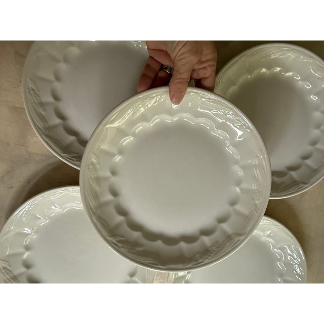 These classic white ironstone dinner plates were made in England by Royal Crownford of Hanley and feature the Wheat...